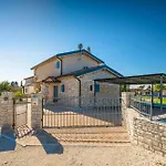 Holiday home Cozy In With Sauna Maruzini